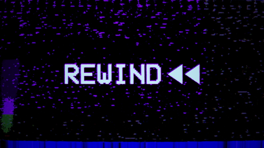 Videocassette recorder (VCR). Rewind sign, arrows. VHS defects, artifacts and noise. Glitches of old damaged tape cassettes. Static dynamic TV noise on display or screen. Retro vintage 4K texture  | Shutterstock HD Video #1081691960