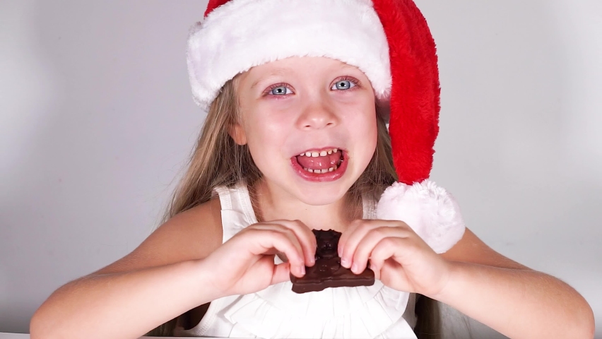 Santa Claus Girl Eating Delicious Milk Stock Footage Video (100% ...