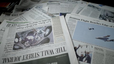 New York, New York  United States -September 2, 2021: Newspaper coverage of Billionaire Branson soars to space aboard Virgin Galactic on its inaugural flight.