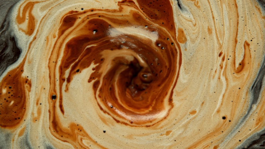 Super slow motion Shot of Swirling Coffee and Cream  | Shutterstock HD Video #1081701827