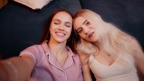 Happy young woman teenagers vloggers using phone waving hand, speaking at camera webcam, video chat with online, selfie video call, talking record lifestyle vlog, young blogger online streaming