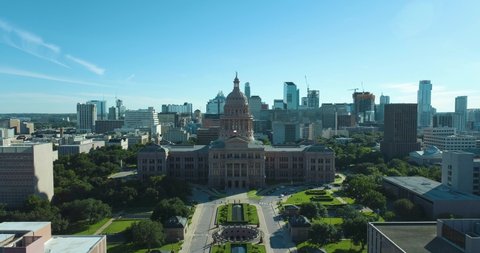 Texas Capitol Building in Downtown Austin TX Flyover with City Skyline (Aerial Drone View in 4k)