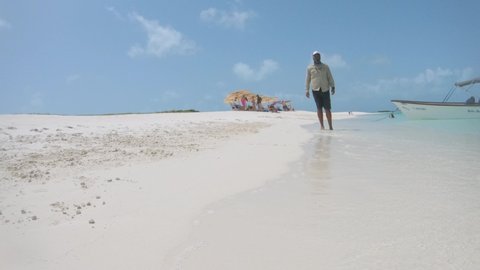 sport fisherman walking on sand Caribbean beach weaaring buff
Fishing Face Mask