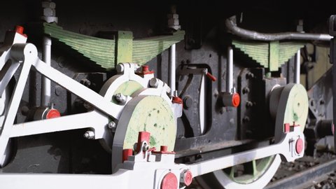 Old Antique Train's Shock Absorber and Wheel Mechanism Close up, Gimbal