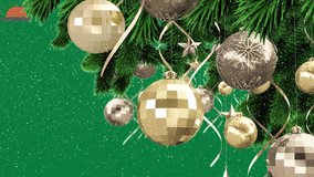 Animation of snow falling over baubles on christmas tree on green background. christmas, tradition and celebration concept digitally generated video.