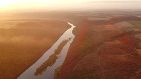 Gorgeous view from a drone flying over the autumn scene in morning. Bird's eye view. Location place Dniester canyon, Ukraine, Europe. Cinematic aerial shot. Beauty earth. Filmed in 4k, drone video.