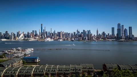 4k timelapse of Manhattan at a sunny day in autumn seen from New Jersey across the Hudson river.