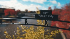 Flint, Michigan Vehicle City sign and Flint River video shot with gimbal.