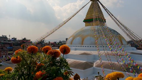 Kathmandu, Nepal - November 1, 2021: A view of the Boudhanath Stupa with its many prayer flags in Kathmandu, Nepal.