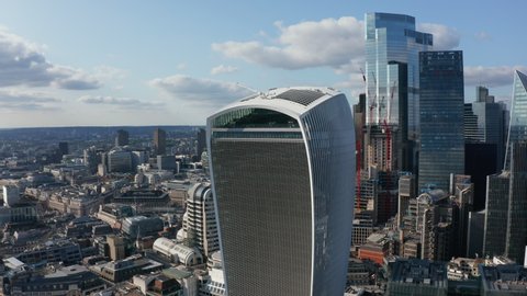 Aerial view of new modern tall office buildings in City district. Sky garden on top of The Walkie Talkie skyscraper. London, UK