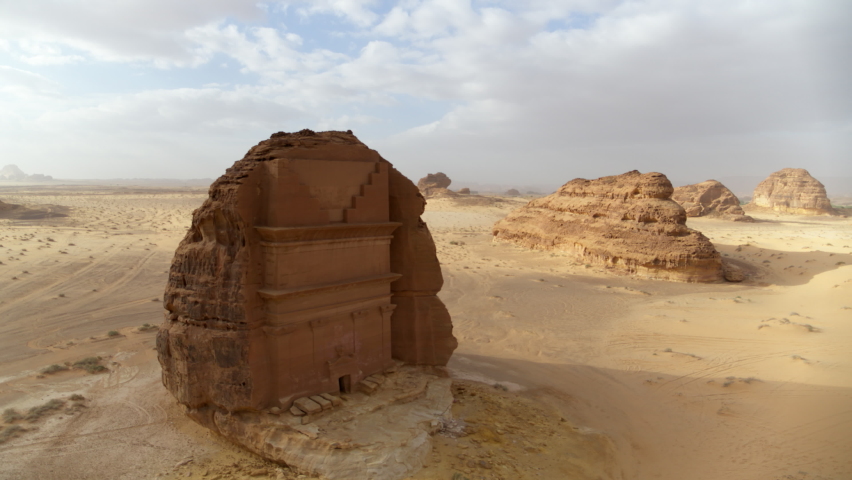 Brown Rock Structure In Desert Against Cloudy Sky - AlUla, Saudi Arabia | Shutterstock HD Video #1081798175