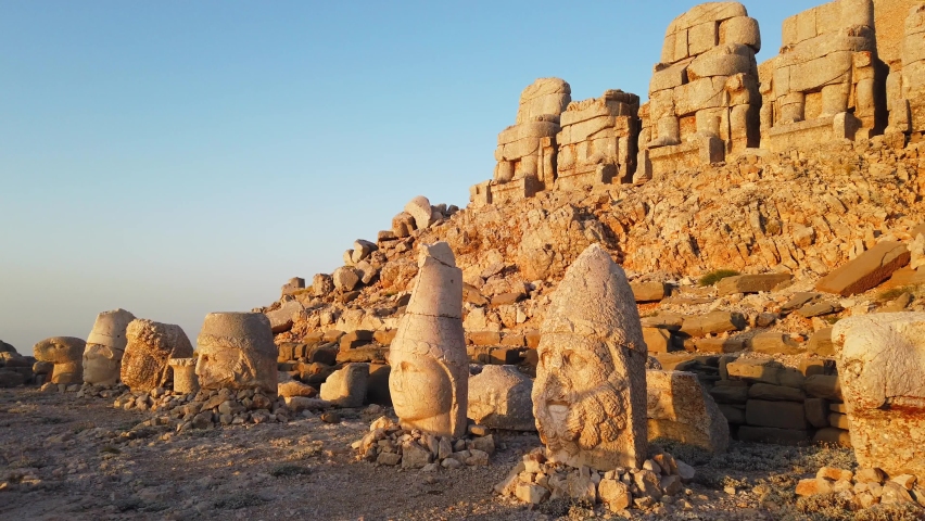 The gigantic statues of gods on mount Nemrut.	 Royalty-Free Stock Footage #1081801415