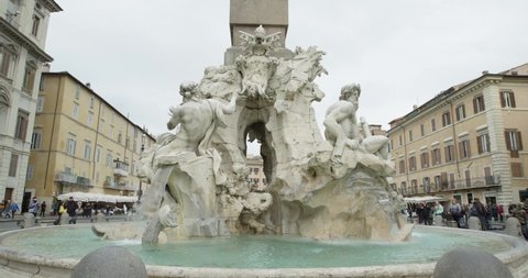 Fountain of the four rivers in Piazza Navona Rome Italy. Slow motion 50fps 4k