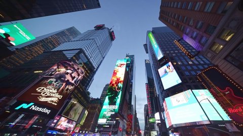 NEW YORK CITY, USA - OCT 21, 2021: Drone low angle shot of Times Square street with billboard ads screens in Manhattan New York City. NYC is a modern urban business city in USA, iconic landmark 