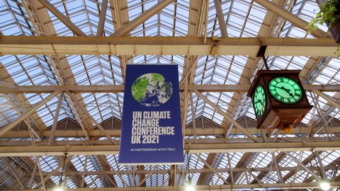 GLASGOW, NOV 2021 - COP 26 banners and signs seen in Glasgow Central Station, as the city plays host to the conference aimed at tackling Climate Change