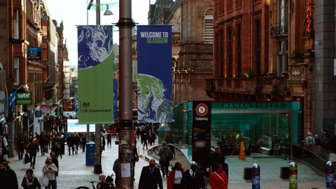 GLASGOW, NOV 2021 - Giant posters announcing COP 26 in Buchanan Street, Glasgow, Scotland, UK, the Conference of the Parties aiming at tackling Climate Change