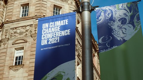 GLASGOW, NOV 2021 - Giant posters announcing COP 26 in Buchanan Street, Glasgow, Scotland, UK, the Conference of the Parties aimed at tackling Climate Change