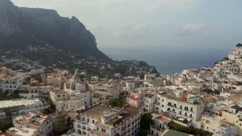 Aerial view of scenic panorama of house facades and historic town center of Positano a province of Catania in Italy in a sunny day.