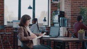 Woman expecting child and taking notes while planning project. Pregnant entrepreneur working on business strategy and analysis, using laptop and notebook to create successful growth. - Powered by Shutterstock - Get 15% off with code: PIKWIZARD15