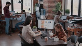 Bored daughter being loud and making noise at business office while mother and colleagues trying to work and do assignment. Single mom feeling stressed about child disturbing people - Powered by Shutterstock - Get 15% off with code: PIKWIZARD15