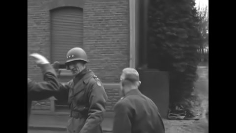 CIRCA 1945 - Generals Bradley, Simpson, and McLain are met by Brigadier General Devine at the 8th Armored headquarters in Holland.