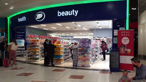 Gatwick airport. UK- 10.10.2021. A branch of the health and beauty retailer Boots in the North Terminal departure hall. 