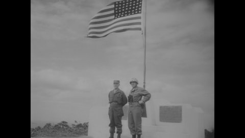 CIRCA 1954 - US Marines reenact the Battle of Iwo Jima on Mount Suribachi.