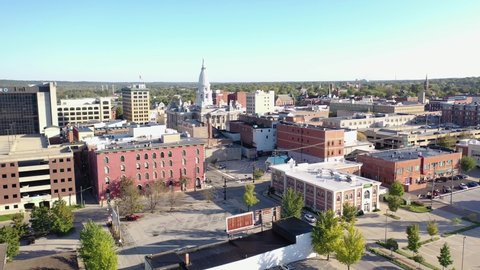LAFAYETTE, INDIANA - CIRCA 2020s - Good aerial of downtown Lafayette Indiana and courthouse tower.