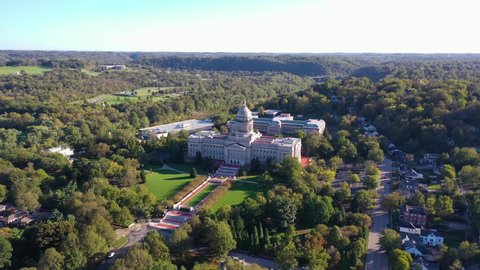 FRANKFORT, KENTUCKY - CIRCA 2020s - Aerial establishing shot of the Kentucky state capitol building in Frankfort, Kentucky.