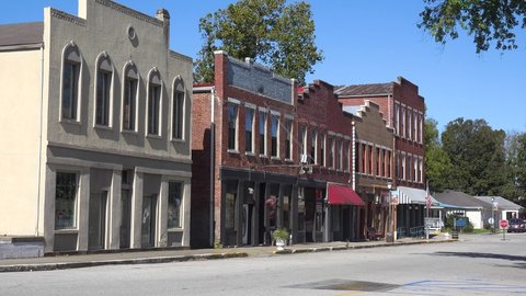 AMERICA - CIRCA 2020s - Establishing shot of main street USA small town in America.