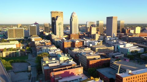 LOUISVILLE, KENTUCKY. - CIRCA 2020s - Aerial establishing shot of the downtown business district of Louisville, Kentucky.