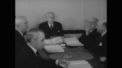 CIRCA 1937 - Jurors confer at a trial and decide that something must be done about organized crime in New York City.