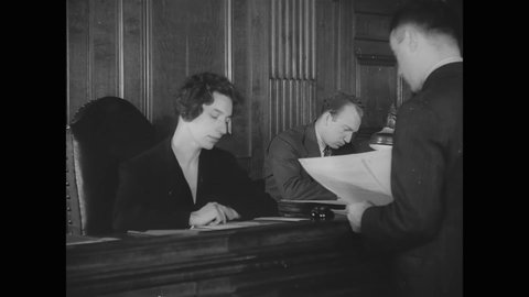 CIRCA 1937 - Judge Justine W. Polier reviews briefs in her New York City office of the Children's Court.