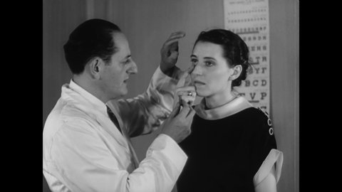 CIRCA 1936 - An optometrist fits a woman with an enormous contact lens prototype (narrated in 1961).