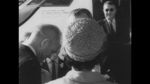 CIRCA 1962 - John Glenn is warmly met by his family and LBJ at Patrick Air Force Base.
