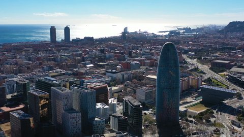 10.04.2019 - Barcelona Spain. Aerial drone video footage from above. The Torre Glòries, formerly known as Torre Agbar. skyscraper located between Avinguda Diagonal and Carrer Badajoz