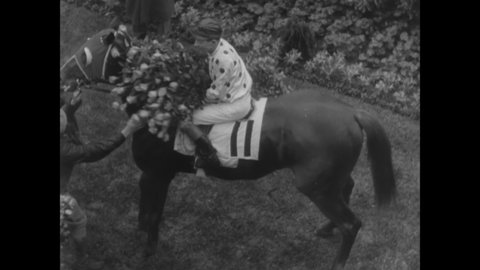 CIRCA 1935 - Thoroughbred racehorse Omaha wins the Kentucky Derby with his jockey Willie Saunders (narrated in 1960).