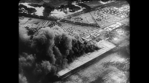 CIRCA 1940s - Reconnaissance photos show the destruction of allied ships bombed by Japanese pilots.