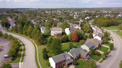 LEXINGTON, KENTUCKY - CIRCA 2020s - Aerial over American suburban middle class neighborhood near Lexington, Kentucky.