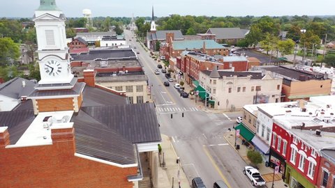 VERSAILLES, KENTUCK - CIRCA 2020s - Rising aerial over typical American USA small town, Versailles, Kentucky.