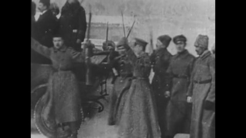 CIRCA 1917 - A Bolshevik kills a Russian soldier after a military parade.