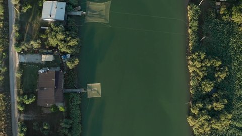 Aerial view of fishing huts in the river, Lido di Dante, Fiumi Uniti, Ravenna near Comacchio valley.