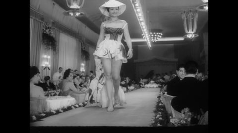 CIRCA 1960 - Women model the latest Italian fashions at a show in San Vincent.