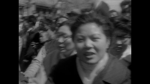 CIRCA 1960 - Violent protests take place in Korea after President Rhee's re-election, contested by voters clashing with police.