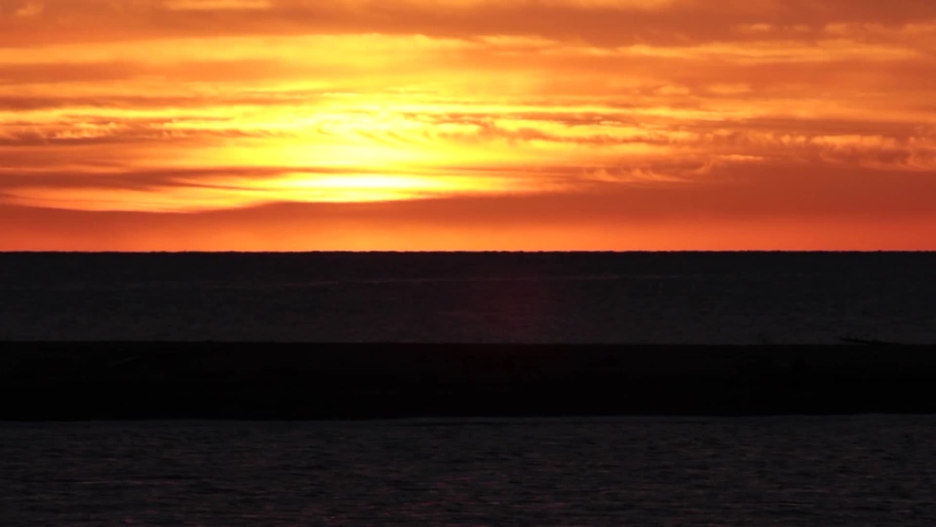 The sunrise over the Saint-Lawrence River in Quebec, Canada