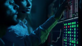 Traders are working with computer. Screen with stock charts and data analysis. Broker trading online. Concept of bitcoin BTC and stock market or crypto trading. - Powered by Shutterstock - Get 15% off with code: PIKWIZARD15