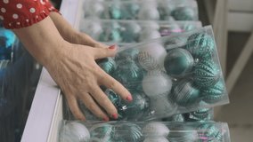 Elderly Woman in Protective Face Mask Buying Set of Christmas Toys. New Normal, Holidays, Shopping and Retirement People Lifestyle Concept - Powered by Shutterstock - Get 15% off with code: PIKWIZARD15