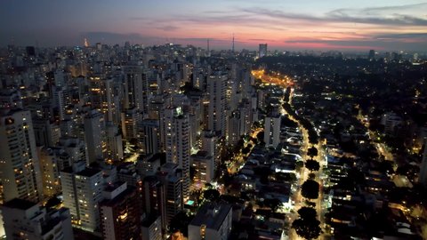 Sao Paulo, Sao Paulo, Brazil - 11.04.2021 - Sunset panoramic view of Pacaembu Avenue landmark of downtown Sao Paulo city. Pacaembu  avenue at Sao Paulo, Brazil. Sunset skyline. Sunset city skyline. 