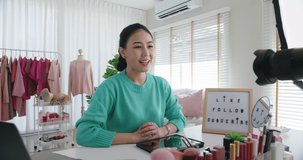 Asia woman micro influencer record live viral video camera at home studio. Happy woman fun talk speak advice review hobby in media. Vlogger selfie shoot enjoy work show smile teach like and share.