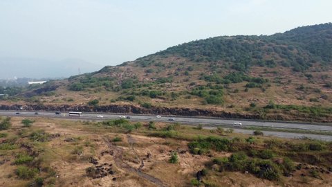 Aerial footage of the Mumbai-Pune Expressway near Pune India. The Expressway is officially called the Yashvantrao Chavan Expressway.